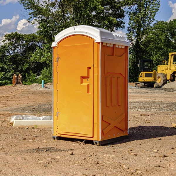 what is the cost difference between standard and deluxe porta potty rentals in Goodwin